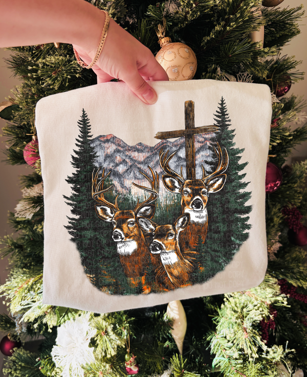 Deer and cross